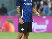 Patrick Cutrone of Como warms up before the Serie A match between SSC Napoli and Como at Stadio Diego Armando Maradona Naples Italy on 4 Oct...