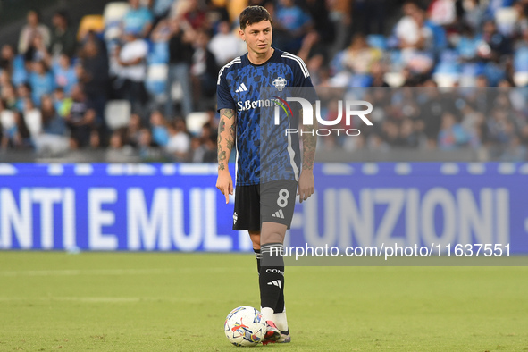 Daniele Baselli of Como warms up before the Serie A match between SSC Napoli and Como at Stadio Diego Armando Maradona Naples Italy on 4 Oct...