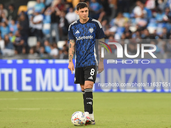 Daniele Baselli of Como warms up before the Serie A match between SSC Napoli and Como at Stadio Diego Armando Maradona Naples Italy on 4 Oct...