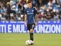 Daniele Baselli of Como warms up before the Serie A match between SSC Napoli and Como at Stadio Diego Armando Maradona Naples Italy on 4 Oct...