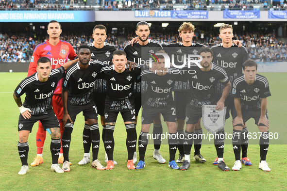 Players of Como line up for a team photo during the Serie A match between SSC Napoli and Como at Stadio Diego Armando Maradona Naples Italy...