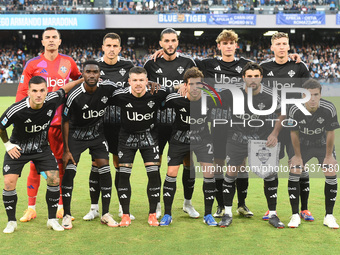 Players of Como line up for a team photo during the Serie A match between SSC Napoli and Como at Stadio Diego Armando Maradona Naples Italy...