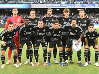 Players of Como line up for a team photo during the Serie A match between SSC Napoli and Como at Stadio Diego Armando Maradona Naples Italy...