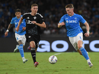 Ignace Van Der Brempt of Como competes for the ball with Scott McTominay of SSC Napoli during the Serie A match between SSC Napoli and Como...