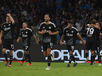 Gabriel Strefezza of Como celebrates with team mates after scoring during the Serie A match between SSC Napoli and Como at Stadio Diego Arma...