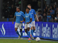 David Neres of SSC Napoli celebrates with team mates after scoring during the Serie A match between SSC Napoli and Como at Stadio Diego Arma...