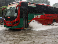 Residents of the city suffer from continuous rain in Dhaka, Bangladesh, on October 5, 2024. (