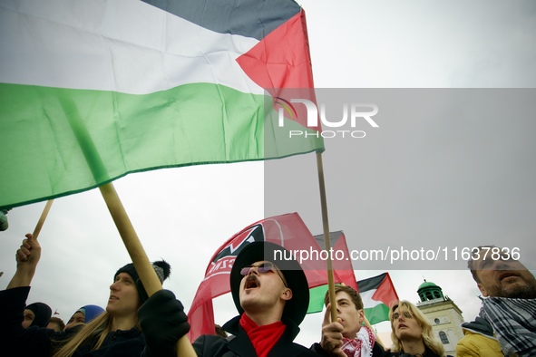 Crowds are sen taking part in a rally in support of Palestine at the Royal Castle Square in Warsaw, Poland on 05 October, 2024. 