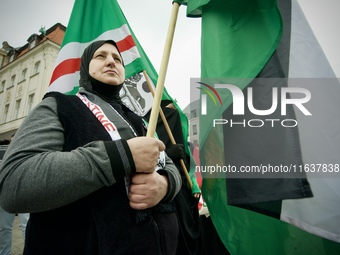 A woman wearing a hijab is seen during a rally in support of Palestine at the Royal Castle Square in Warsaw, Poland on 05 October, 2024. (