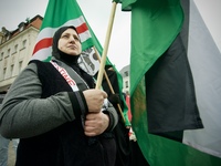 A woman wearing a hijab is seen during a rally in support of Palestine at the Royal Castle Square in Warsaw, Poland on 05 October, 2024. (