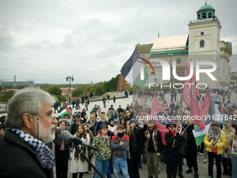 Crowds are seen taking part in a rally in support of Palestine at the Royal Castle Square in Warsaw, Poland on 05 October, 2024. (