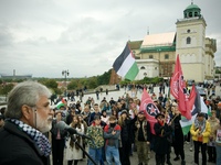 Crowds are seen taking part in a rally in support of Palestine at the Royal Castle Square in Warsaw, Poland on 05 October, 2024. (