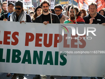 The banner reads 'Lebanese people'. Hundreds of people demonstrate in Toulouse, France, on October 5, 2024, in support of Gazans, the Gaza S...