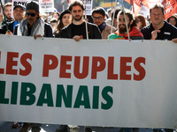 The banner reads 'Lebanese people'. Hundreds of people demonstrate in Toulouse, France, on October 5, 2024, in support of Gazans, the Gaza S...