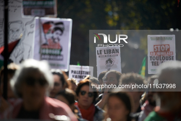 The placard reads 'Lebanon bleeds but resists'. Hundreds of people demonstrate in Toulouse, France, on October 5, 2024, in support of Gazans...