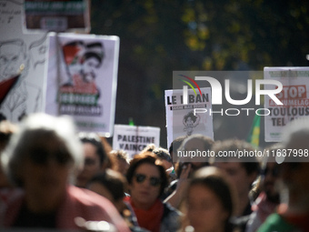 The placard reads 'Lebanon bleeds but resists'. Hundreds of people demonstrate in Toulouse, France, on October 5, 2024, in support of Gazans...