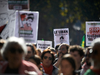 The placard reads 'Lebanon bleeds but resists'. Hundreds of people demonstrate in Toulouse, France, on October 5, 2024, in support of Gazans...