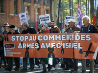 The banner reads 'Stop the selling of arms to Israel'. Hundreds of people demonstrate in Toulouse, France, on October 5, 2024, in support of...