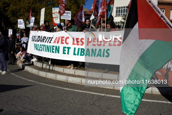 The banner reads 'Solidarity with the Palestinian and Lebanese people'. Hundreds of people demonstrate in Toulouse, France, on October 5, 20...