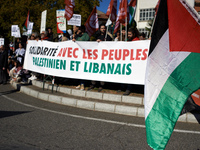 The banner reads 'Solidarity with the Palestinian and Lebanese people'. Hundreds of people demonstrate in Toulouse, France, on October 5, 20...