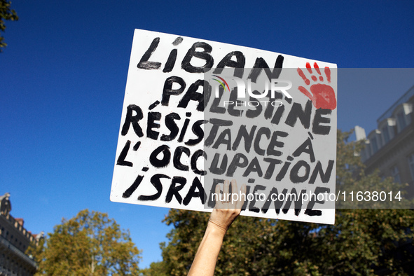 A placard reads 'Lebanon, Palestine, Resistance to the Israeli occupation'. Hundreds of people demonstrate in Toulouse, France, on October 5...