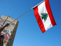 A protester waves the Lebanese flag. Hundreds of people demonstrate in Toulouse, France, on October 5, 2024, in support of Gazans, the Gaza...