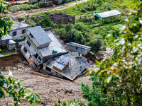 After the flood of the Nakhu River, many homes are damaged in the Bhardev region of southern Lalitpur, Nepal, on October 5, 2024. Homes are...