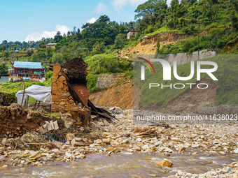 After the flood of the Nakhu River, many homes are damaged in the Bhardev region of southern Lalitpur, Nepal, on October 5, 2024. Homes are...