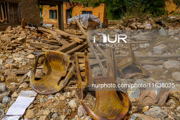 After the flood of the Nakhu River, many homes are damaged in the Bhardev region of southern Lalitpur, Nepal, on October 5, 2024. Homes are...