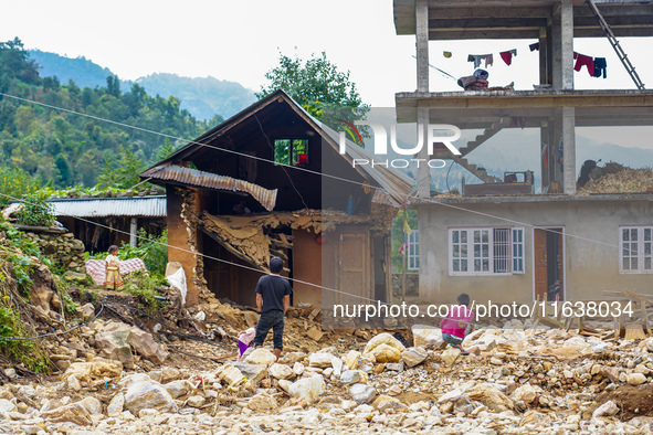 After the flood of the Nakhu River, many homes are damaged in the Bhardev region of southern Lalitpur, Nepal, on October 5, 2024. Homes are...