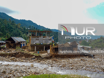 After the flood of the Nakhu River, many homes are damaged in the Bhardev region of southern Lalitpur, Nepal, on October 5, 2024. Homes are...