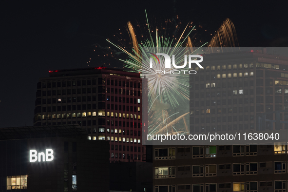 Fireworks illuminate the skyline of Yeouido during the Seoul International Fireworks Festival, drawing thousands of spectators and photograp...