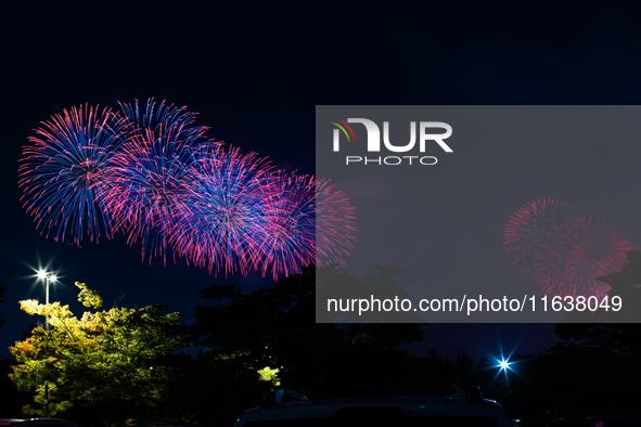 Fireworks illuminate the skyline of Yeouido during the Seoul International Fireworks Festival, drawing thousands of spectators and photograp...