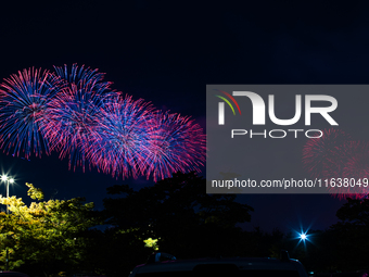 Fireworks illuminate the skyline of Yeouido during the Seoul International Fireworks Festival, drawing thousands of spectators and photograp...