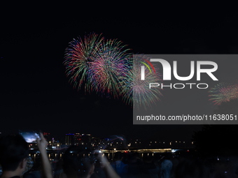 Fireworks illuminate the skyline of Yeouido during the Seoul International Fireworks Festival, drawing thousands of spectators and photograp...