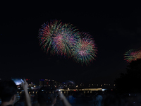 Fireworks illuminate the skyline of Yeouido during the Seoul International Fireworks Festival, drawing thousands of spectators and photograp...