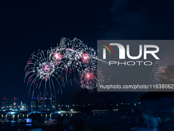 Fireworks illuminate the skyline of Yeouido during the Seoul International Fireworks Festival, drawing thousands of spectators and photograp...