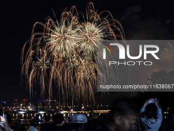 Fireworks illuminate the skyline of Yeouido during the Seoul International Fireworks Festival, drawing thousands of spectators and photograp...