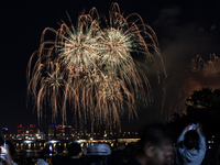 Fireworks illuminate the skyline of Yeouido during the Seoul International Fireworks Festival, drawing thousands of spectators and photograp...