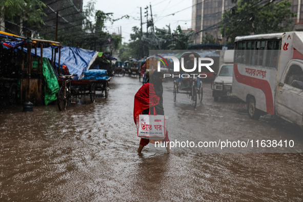 Continuous rain causes waterlogging in different areas of the capital, disrupting the daily life of the residents, on October 5, 2024. 