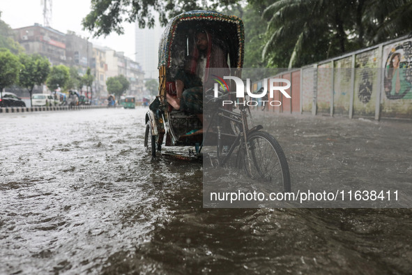 Continuous rain causes waterlogging in different areas of the capital, disrupting the daily life of the residents, on October 5, 2024. 