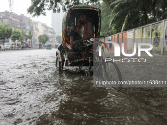 Continuous rain causes waterlogging in different areas of the capital, disrupting the daily life of the residents, on October 5, 2024. (