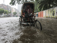 Continuous rain causes waterlogging in different areas of the capital, disrupting the daily life of the residents, on October 5, 2024. (