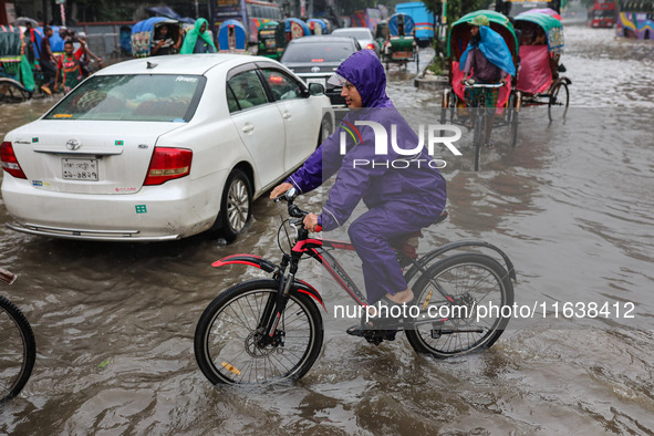 Continuous rain causes waterlogging in different areas of the capital, disrupting the daily life of the residents, on October 5, 2024. 