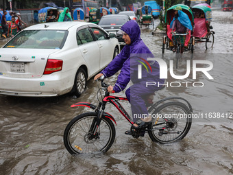 Continuous rain causes waterlogging in different areas of the capital, disrupting the daily life of the residents, on October 5, 2024. (