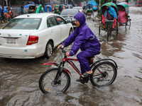 Continuous rain causes waterlogging in different areas of the capital, disrupting the daily life of the residents, on October 5, 2024. (