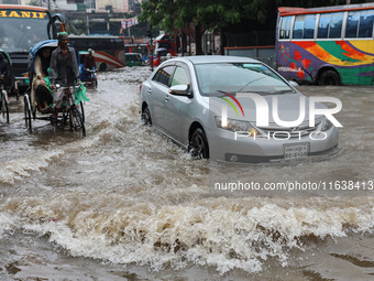 Continuous rain causes waterlogging in different areas of the capital, disrupting the daily life of the residents, on October 5, 2024. (