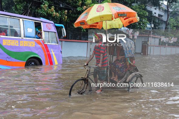 Continuous rain causes waterlogging in different areas of the capital, disrupting the daily life of the residents, on October 5, 2024. 