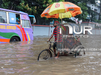 Continuous rain causes waterlogging in different areas of the capital, disrupting the daily life of the residents, on October 5, 2024. (