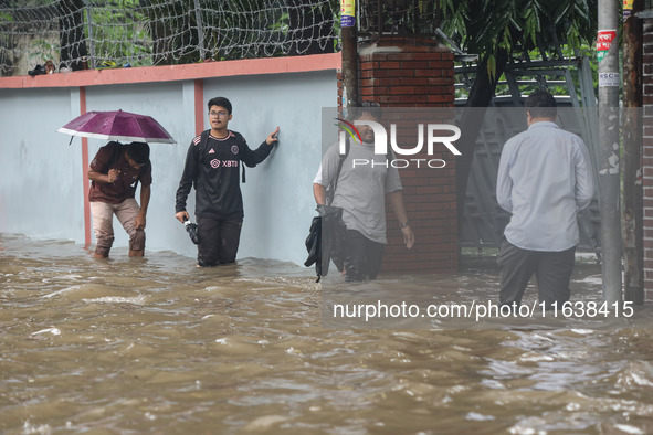 Continuous rain causes waterlogging in different areas of the capital, disrupting the daily life of the residents, on October 5, 2024. 